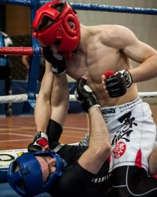 Miha Perhavec competing in MMA