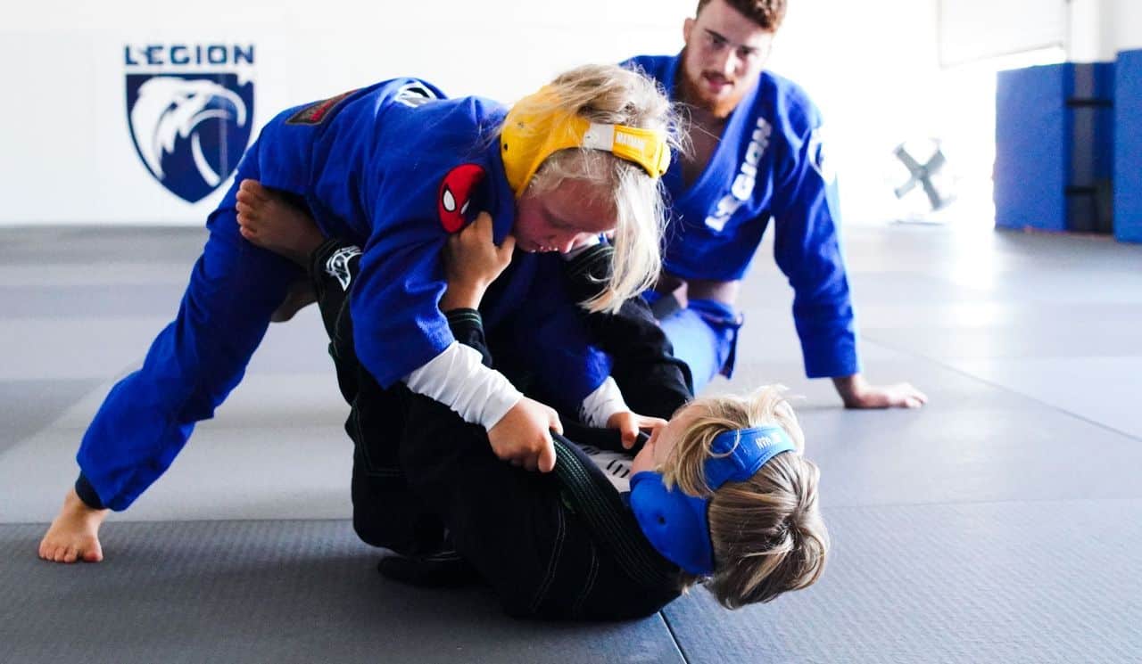 paxton-doing-the-overhead-sweep-in-jiu-jitsu-class